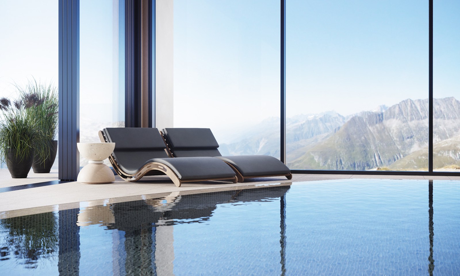 C.O.D.E C.O.D.E Dune chaise longues beside an indoor pool with mountain views