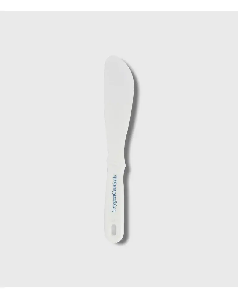 OxygenCeuticals Spatula with OxygenCeuticals logo, front view